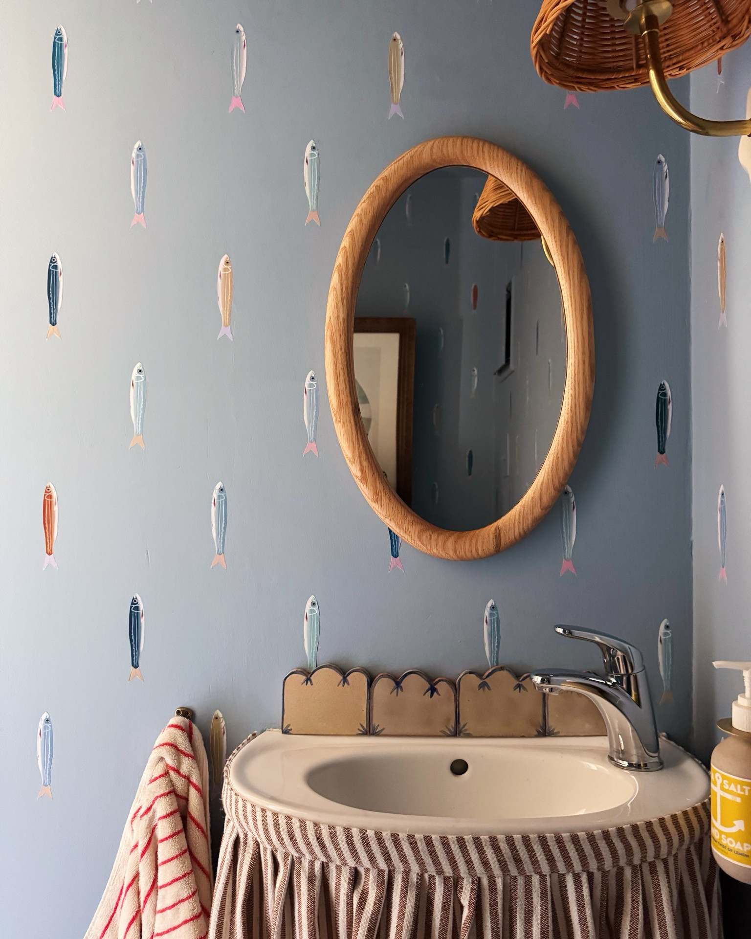 our little powder room & mudroom — still need to fix the floors 🙃