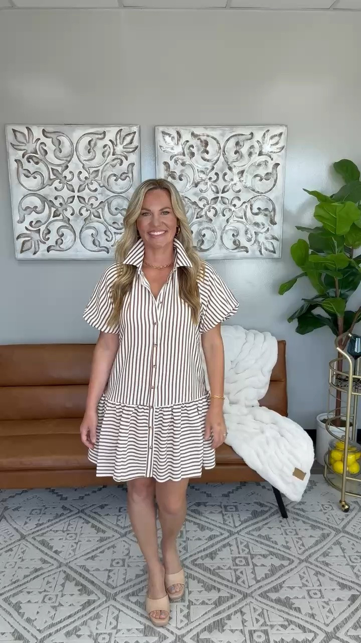 This is the kind of dress that makes getting ready feel effortless. The soft neutral stripes and relaxed fit give it that easy summer polish, while the button detail and flowy shape keep it feeling feminine and put together. Perfect for warm days when you want something cute that still feels comfortable and easy to wear from day to night.

Striped summer dress, neutral outfit, easy throw on dress, warm weather style, everyday casual outfit, feminine summer dress, effortless chic, weekend outfit idea, vacation ready style, AudrieDollins

#LTKootd #LTKSeasonal #LTKOver40