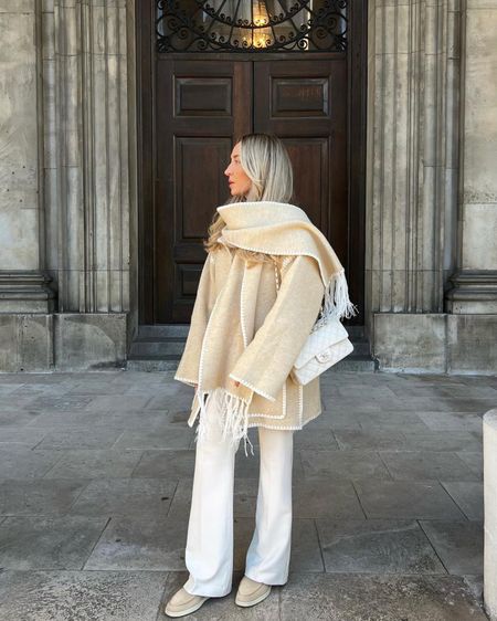 Creamy tones in winter is a personal fave. I've been absolutely loving my loro piana shoes for this kinda look. I've gone with the coat of the season with its integrated scarf (so chic!), cashmere jumper, cream trousers & white classic flap.

#LTKSeasonal #LTKstyletip #LTKeurope