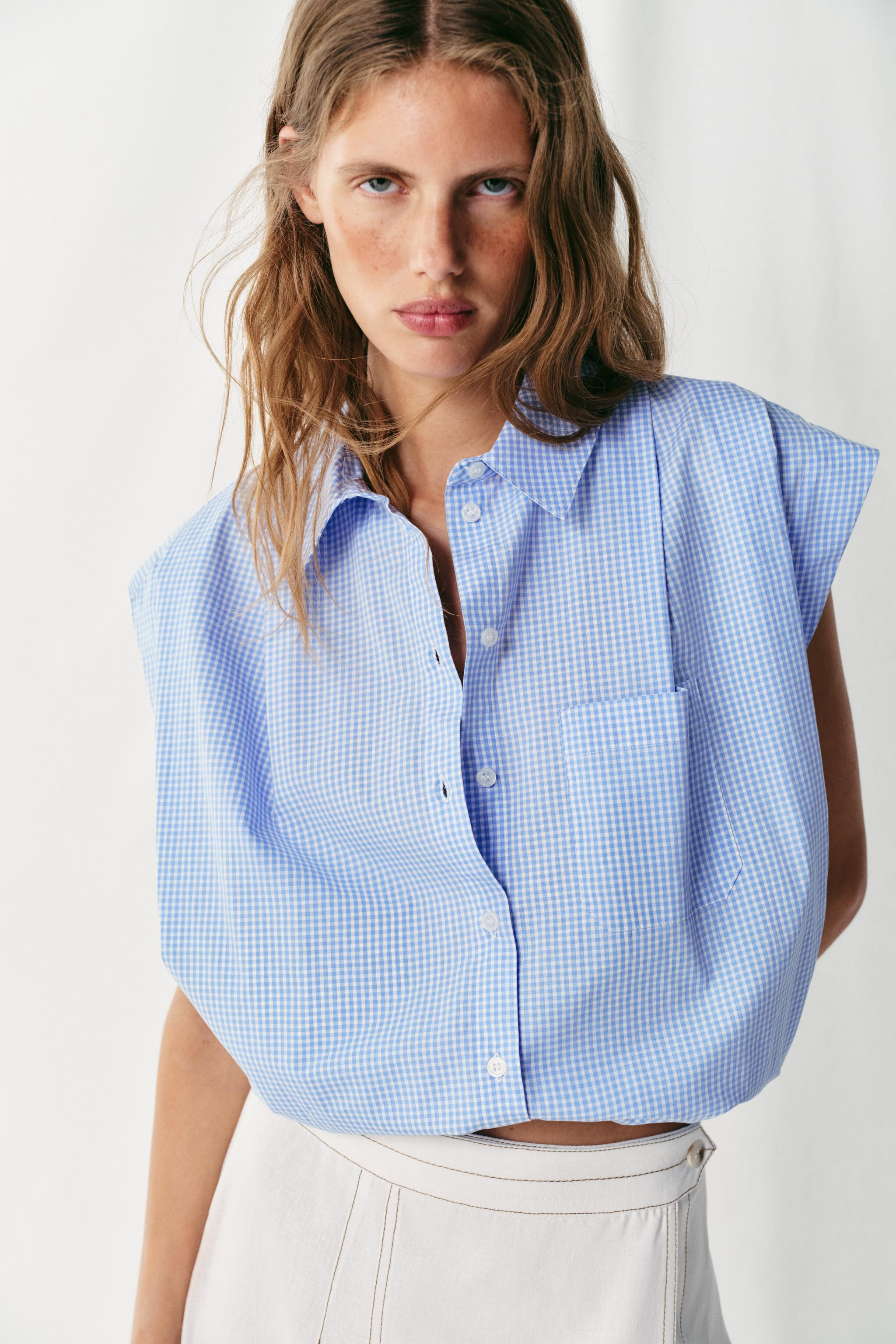 Sleeveless shirt with lapel collar and pleats at the shoulders. Front patch pocket. Balloon and e... | Zara US