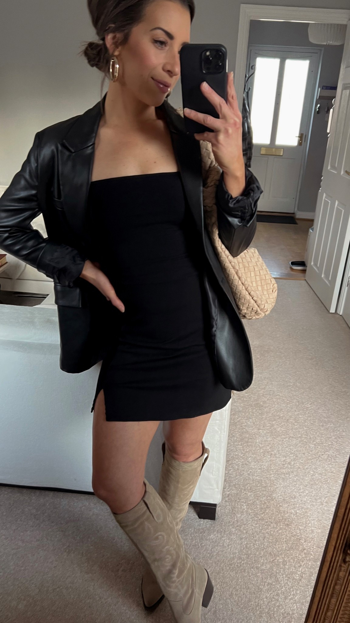 Concert outfit idea. OOTN. Night out outfit. Suede western boots. Suede woven shoulder bag. Black mini skirt. Black faux leather blazer. Spring outfit. Spring style. Concert style. Girls night out.  Style inspo. Outfit inspo. 

#LTKFindsUnder100 #LTKItBag #LTKShoeCrush