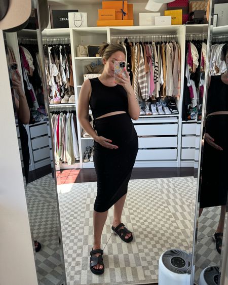 2 piece maternity set for spring/summer 🖤 such a great classic! Cropped top with rouched sides, love the high waisted skirt paired with it. In a size medium and fits now. Might not fit in a couple of weeks 🤣 shoes are so comfortable and only $30!! Come in other colors, too!

Maternity, spring sets, black skirt, designer lookalike, designer sandals, black sandals, bump outfits, third trimester 

#LTKbump #LTKshoecrush #LTKSeasonal