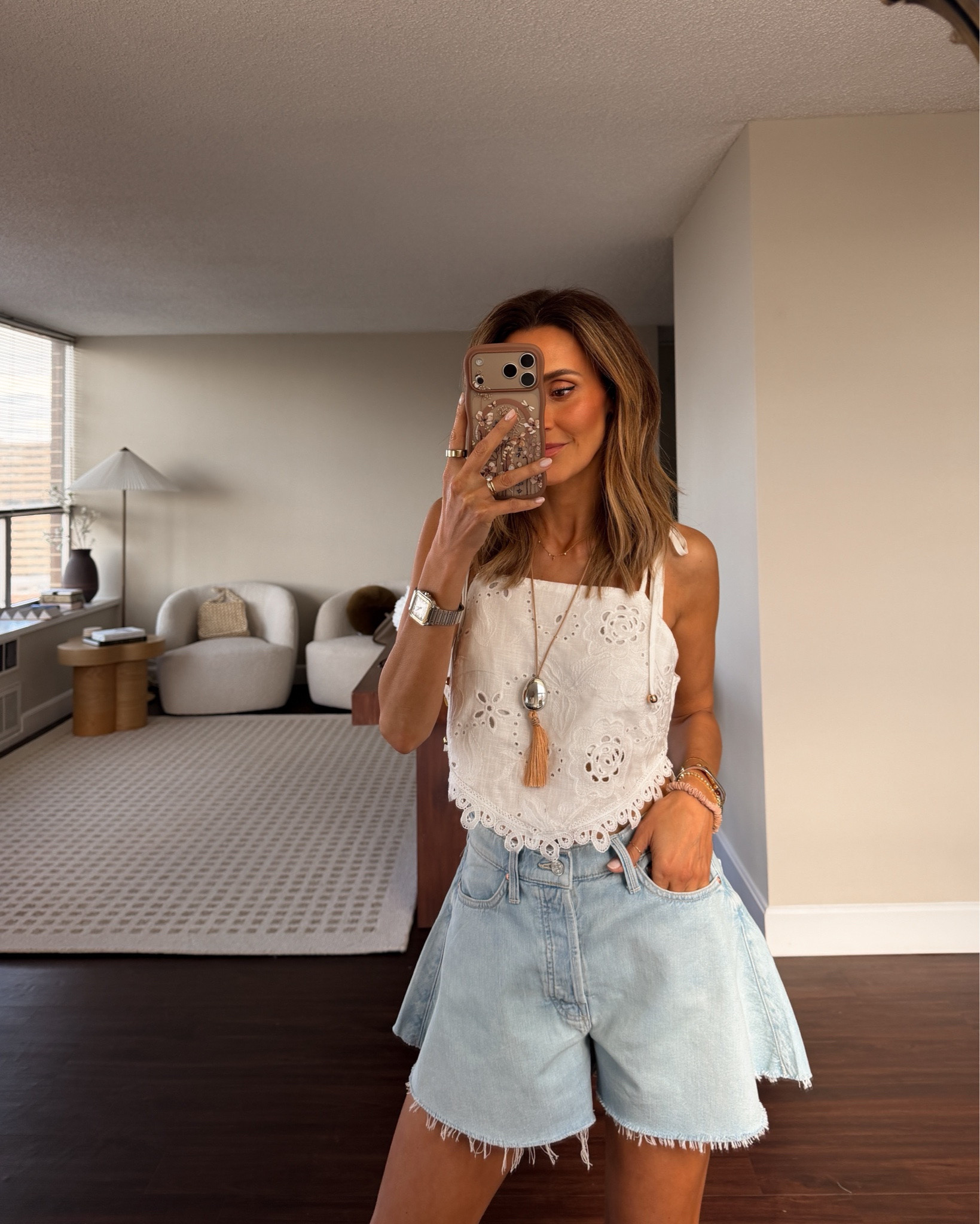 The cutest cut off shorts that look like a mini skirt!! Tts/25 - loving the eyelet top, went with size small for length 
20% off with code KARINA20 today!

#LTKSaleAlert #LTKOver40 #LTKSeasonal