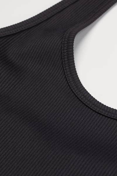 Crop top with halter neck in soft, ribbed jersey. | H&M (US + CA)