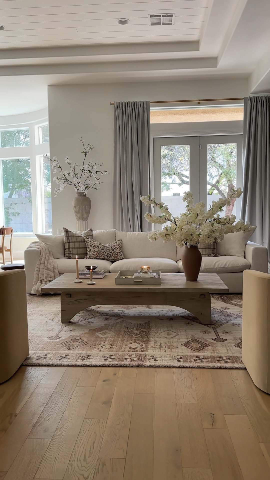 Living room and dining room 

Coffee table, florals, vases, chairs, couch #LTKfamily #LTKstyletip

#LTKVideo