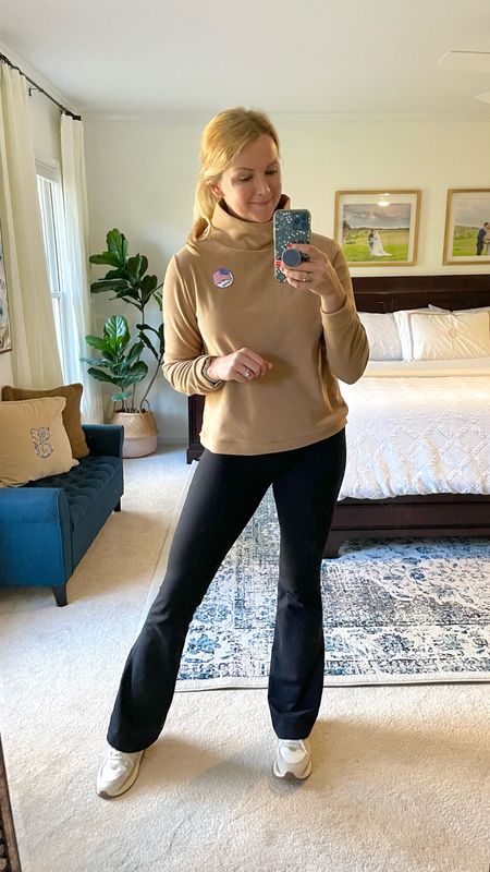 Cozy fleece sweater with stand up turtleneck. Camel color and I sized up one for a looser fit.

High waisted flare pants are stretchy & fit true to size.

Leather taupe and white sneakers fit true to size



#LTKSeasonal #LTKstyletip #LTKHoliday