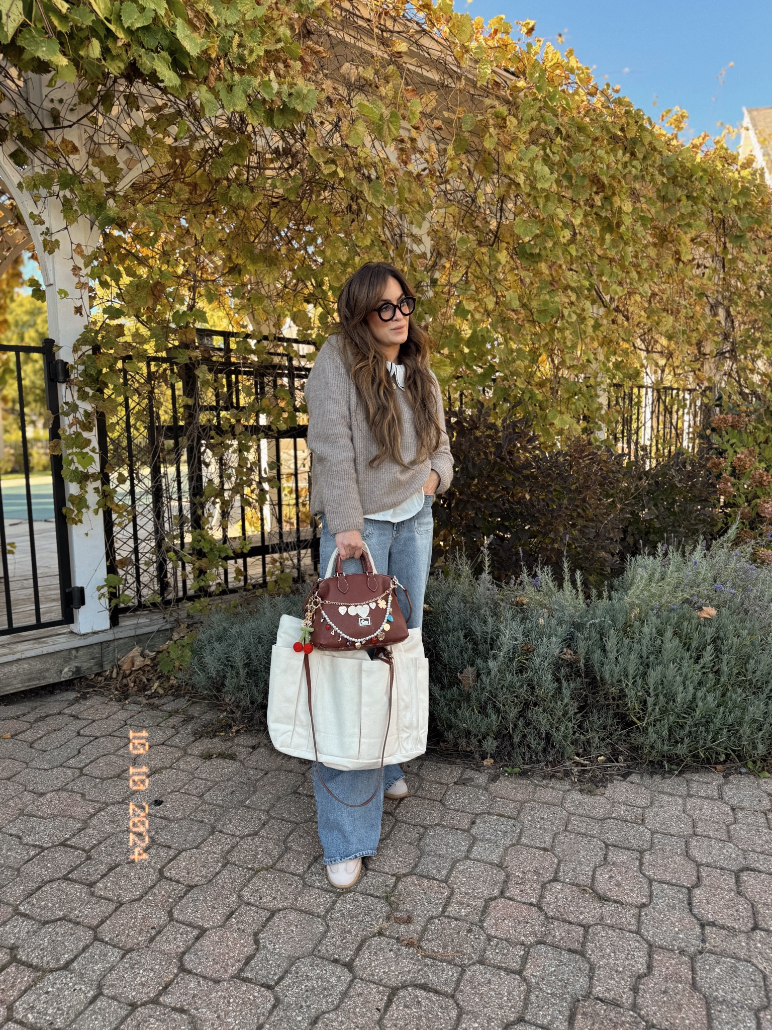 Cozy mom fit of the day: cute thrifted bag with purse charms, a tote that zips up & has an abundance of pockets to hold all of the things, cozy wide leg denim that looks a little more tailored, & a cozy perfect sweater with a Peter Pan collar shirt. Oh, and don’t forget the cozy tennis shoes perfect for the mom on the go. 

#LTKSaleAlert #LTKSeasonal