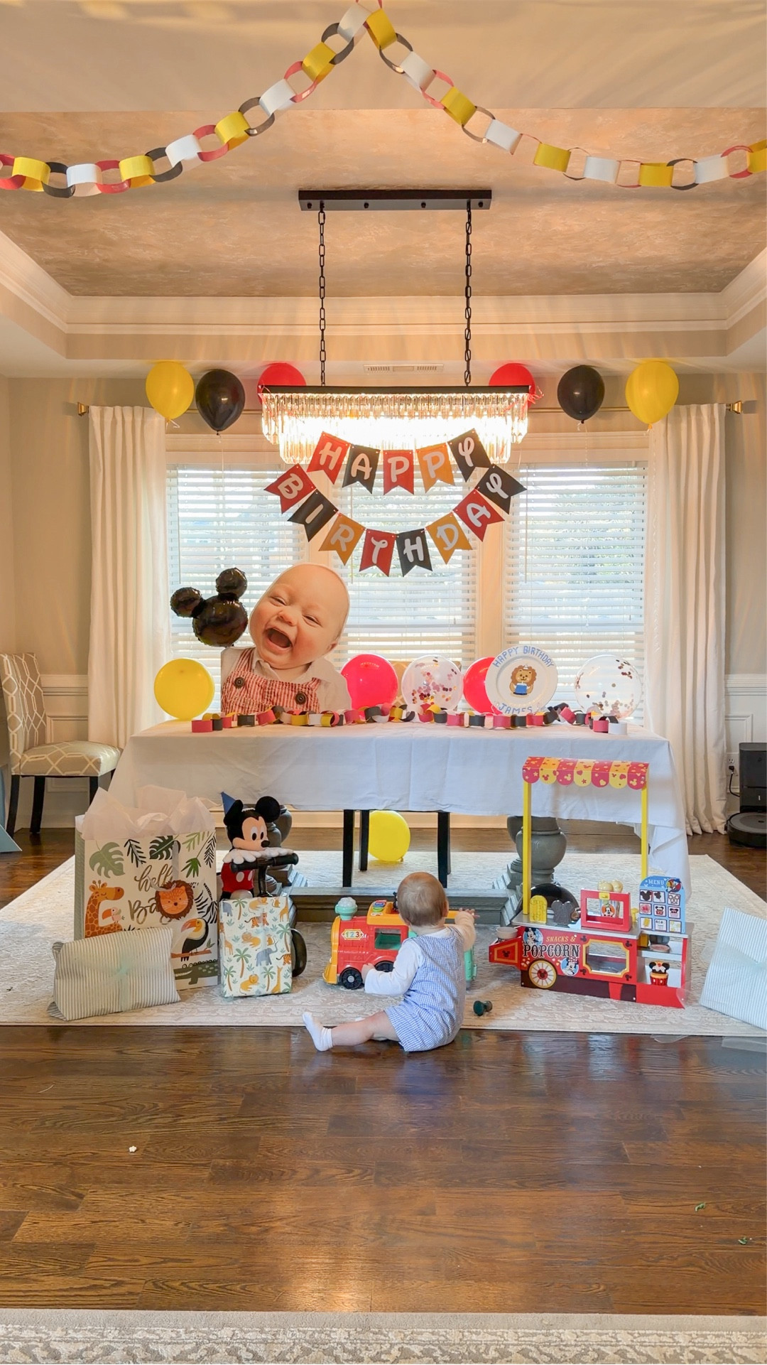 Last night after James went to bed, I turned our dining room into a little slice of magic. ❤️

Streamers, balloons, wrapping paper everywhere… Mickey watching from the corner… and me on the floor at midnight tying bows and taping banners!

There’s something so sweet about decorating the night before your baby’s first birthday — quietly blowing up balloons, setting out his gifts, hanging the Happy Birthday banner — just imagining his face when he wakes up.

This year’s theme: classic Mickey Mouse! Bright reds, yellows, black and the cutest little toys and keepsakes waiting for him in the morning.

One whole year of loving our boy and getting to create  magic for him! 

Linked my favorite Mickey birthday decor, balloons, gifts, and party finds on LTK for anyone planning a first birthday or Disney-themed celebration. ✨🎈

#LTKBaby #LTKKids #LTKmomlife
