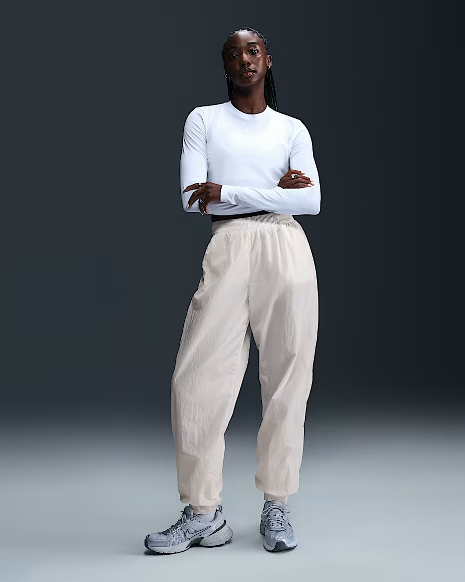 Sustainable MaterialsNike Sportswear EssentialWomen's Mid-Rise Oversized Woven Joggers | Nike (US)