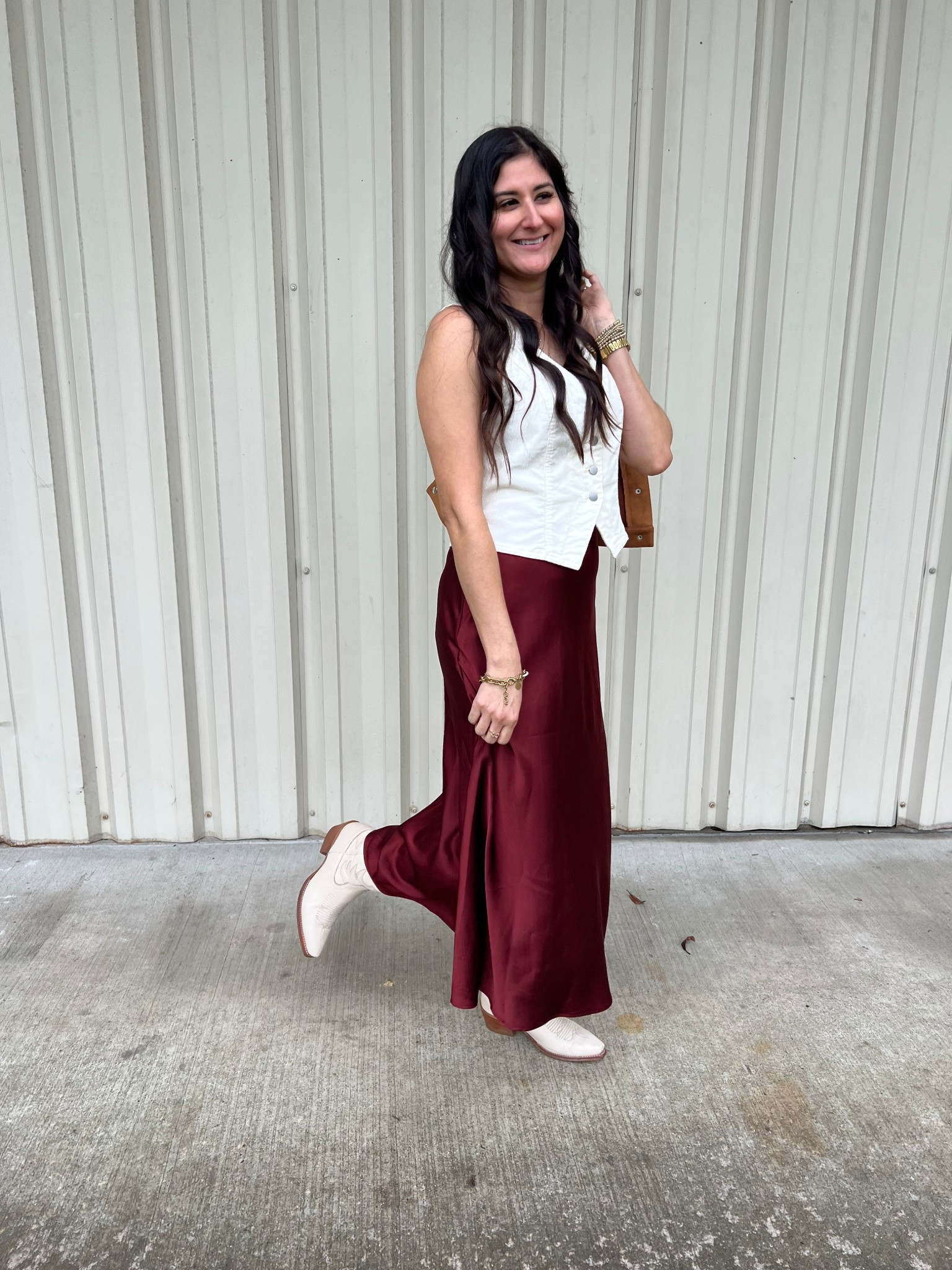 I love a good satin skirt! They can be worn so many ways from work, to leisure, to western. So many ways. I styled mine with cowboy boots and a corduroy vest. Add a cute belt and hat to make it rodeo outfit. 

#LTKSeasonal #LTKWorkwear #LTKootd