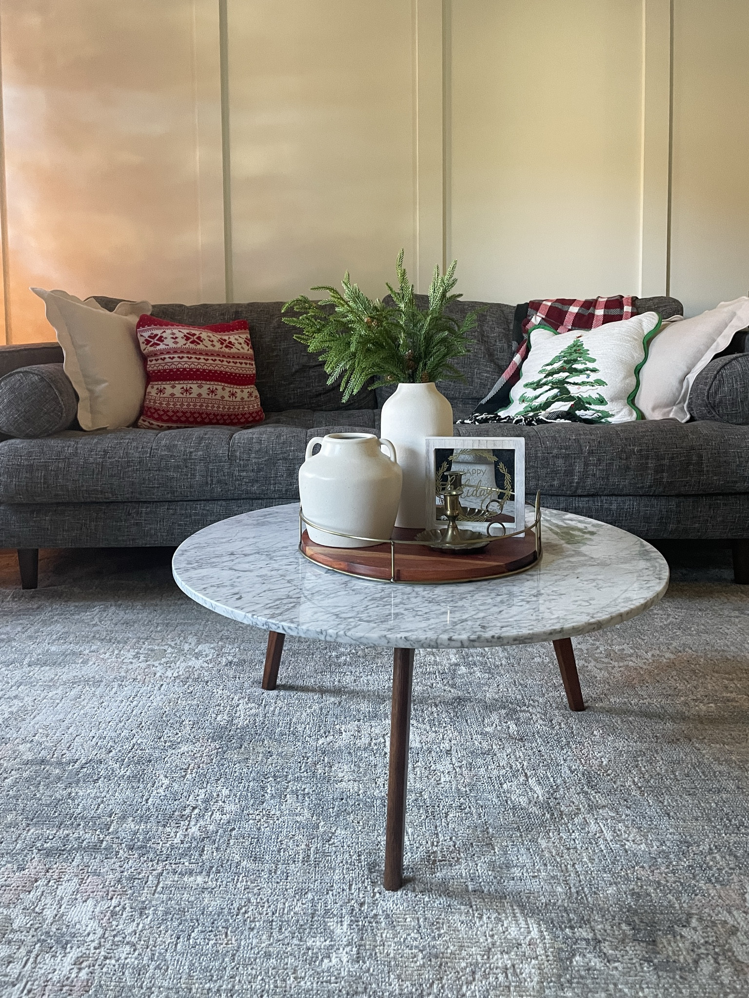 Easy Christmas coffee table tray styling.  

Marble coffee table.  Loloi area rug.  Tray.  White vase.  Gray sofa.  Christmas pillows.  Living room.  

#LTKHoliday #LTKSeasonal #LTKHome