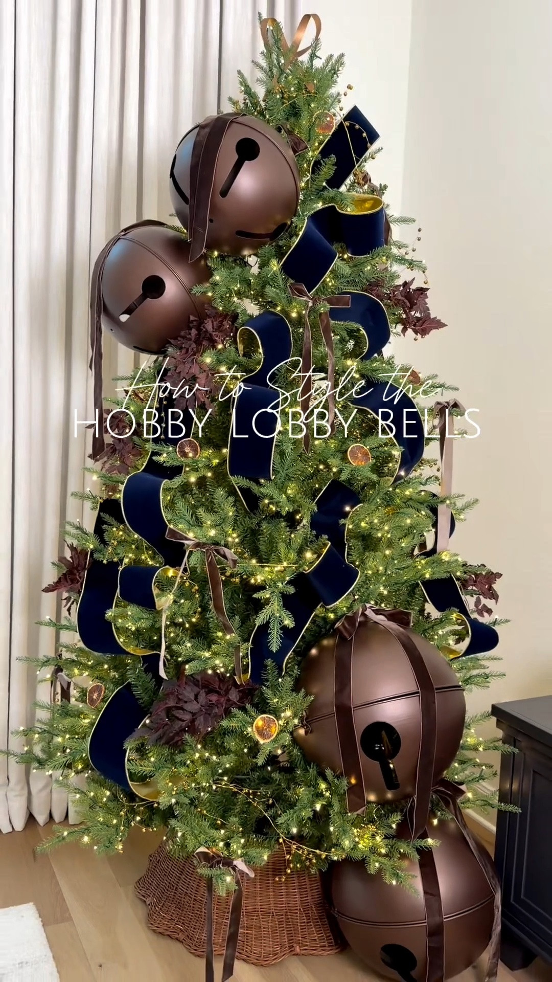 How to style THE Hobby Lobby Bells🌲
They may be oversized but definitely make a statement r! I added a beautiful chocolate velvety ribbon for a less rustic, more elevated look.
Tip, leave them on the ripe they come on and use that to attach to the tree which gets hidden and then pull your new ribbon forward for looks.