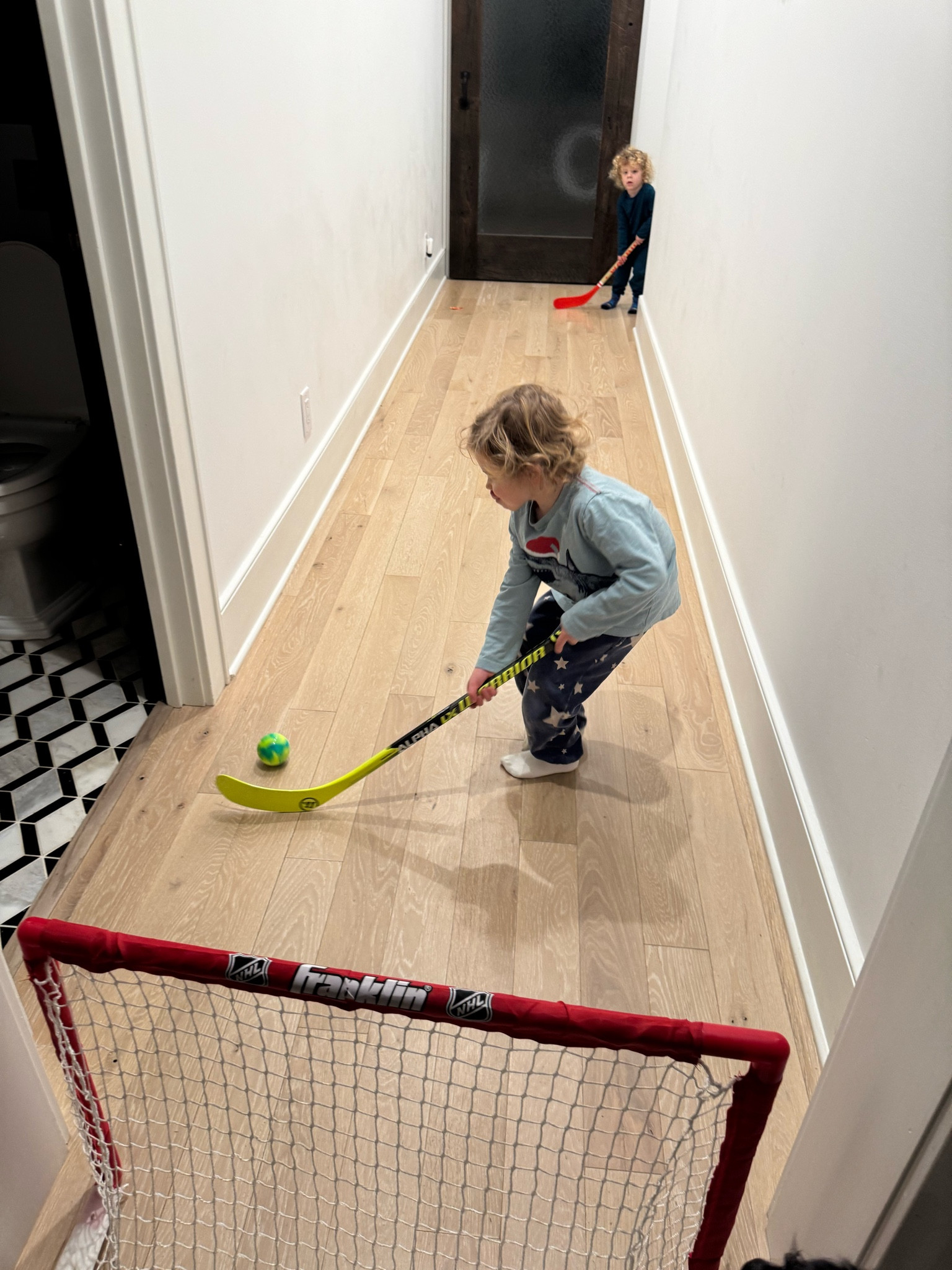 Hallway hockey for the littles! Whether it's rainy outside or you're just looking for a fun indoor activity, this hockey goal and stick set is great for some indoor energy. Perfect for toddlers to preschoolers, it's not just about the fun—it’s about building those all-important skills like hand-eye coordination and teamwork. Set it up in the hallway, and let the games begin! Check this out in my LTK shop to grab yours and keep those little hands and minds busy this winter.

Also makes a great gift! 

The Franklin set here comes with small sticks to start with. Next step up is a 27” Warrior LX pro mini for our toddler and preschooler (who is 40” tall). 

#HockeyFun #IndoorActivities #SkillBuilding #LTKKids #MomWin

#LTKFamily