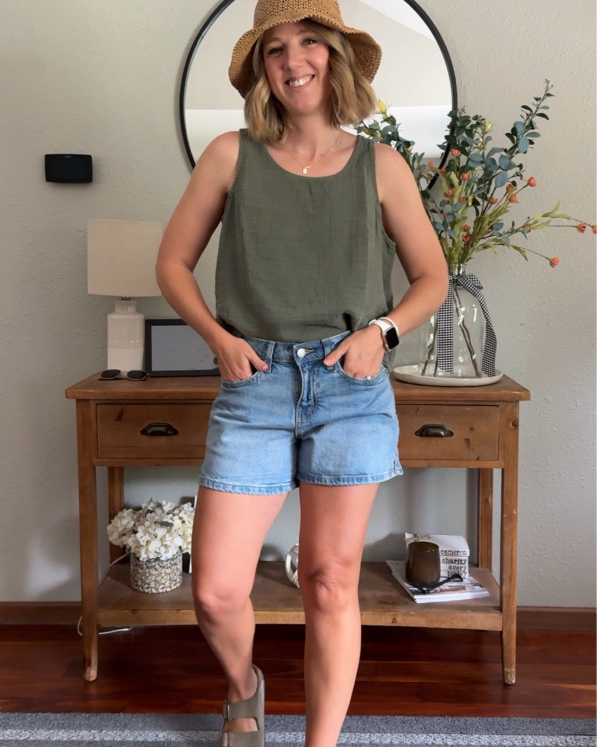 Outfit 1 
Size small in the tank and size 4 in the shorts. 

Outfit 2 
My tank is a size small and shorts are a size 26. 

Outfit 3
My skirt is from last year, but I linked a similar one. It’s an xs. The tank is a size small. 

Outfit 4 
Overalls are a size small, I could have maybe went down a size. My tank is a size medium. I size up one for length.

#LTKootd