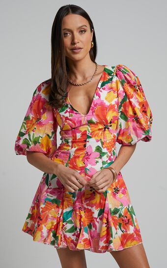 Shairah Mini Dress - V Neck Puff Sleeve Flutter Hem Dress in In Bloom | Showpo (US, UK & Europe)