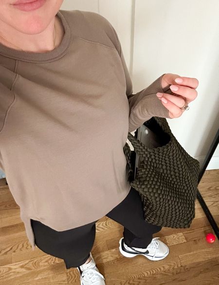 I’ve seen faux leather versions of this bag but this is the first time I’ve seen a neoprene lookalike of the Naghedi version (which is $200+) – available in several colors but I ordered this deep olive for under $80!

#LTKstyletip #LTKFestival #LTKitbag