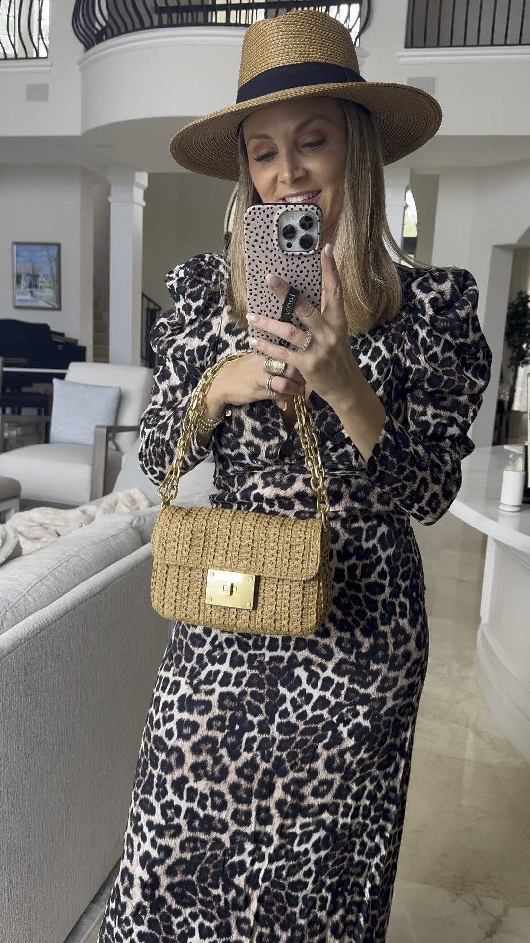 Loving how my new @ericjavits accessories elevate my leopard dress! My Squishee® Instinct fedora, adorned with a sleek black ribbon, is effortlessly chic. Plus, it’s soft, lightweight, and packable while blocking 98% of those pesky sun rays. And I can’t stop raving about my Lil Cherie raffia bag—it’s so versatile with three stylish options and an outside pocket for quick phone access. 👜✨ #StyleGoals 

#LTKFindsUnder50 #LTKFindsUnder100 #LTKOver40
