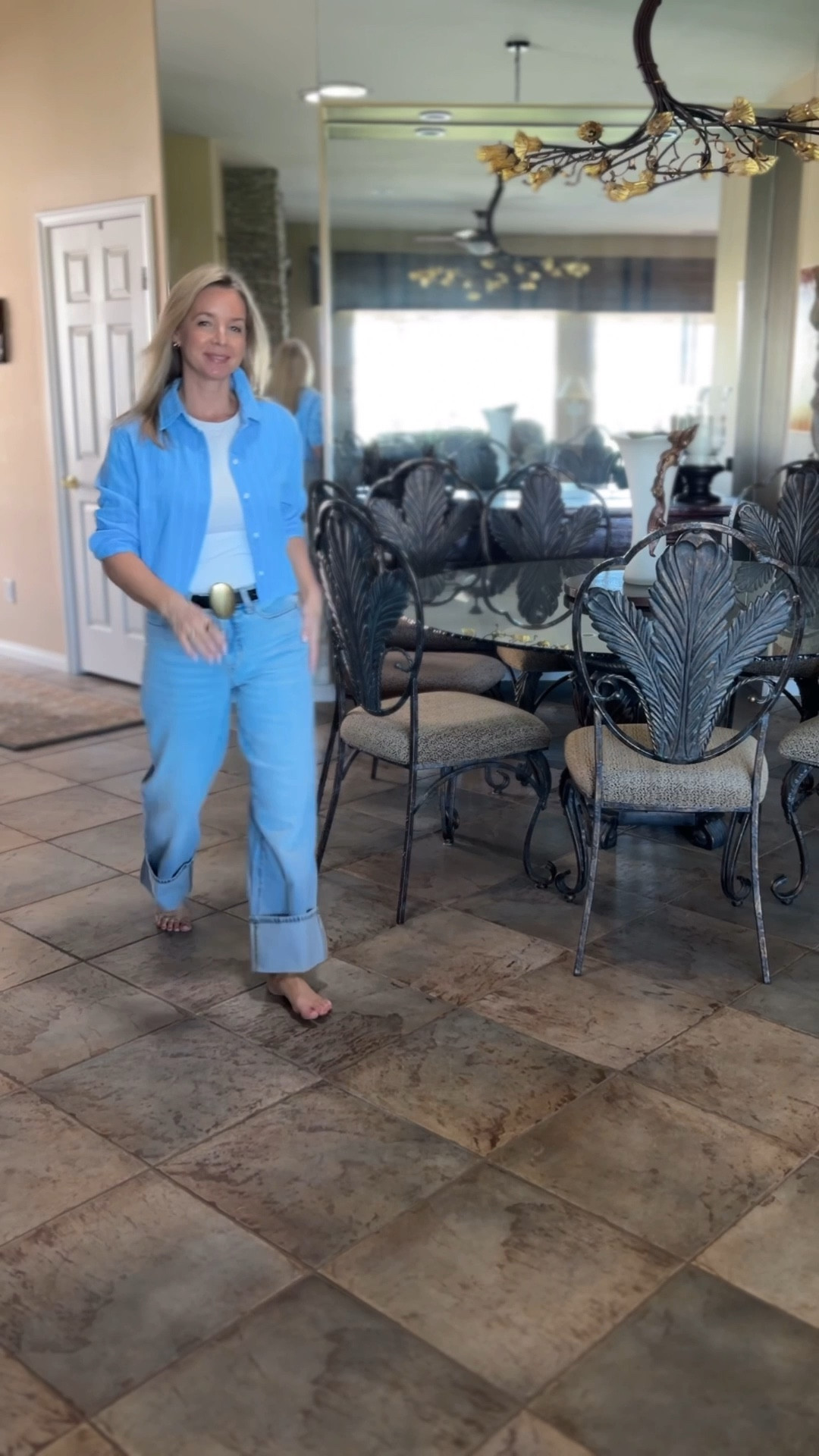 This is a bit trendier than I normally wear but I feel like they are all grounded in classic style. 
The blue button up is cropped, light denim jeans with the oversized cuff and the statement belt (that looks much like the designer brand, Celine)trendstrends

#LTKootd #LTKspring #LTKspringtrends