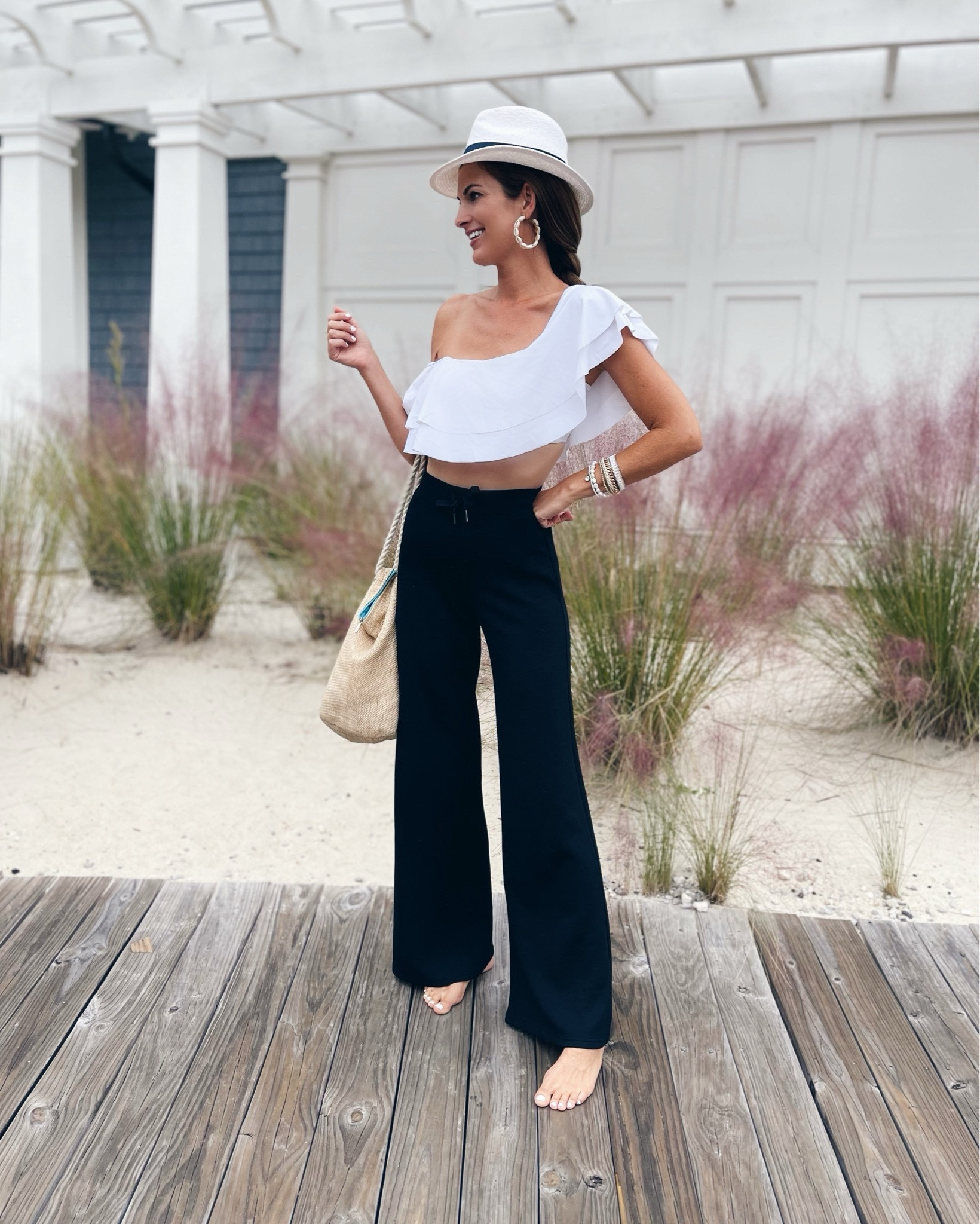 Headed to the beach club knowing I wouldn’t swim 😀. These wide leg lounge pants (that come in petite and tall) doubles as swim coverup bottoms!

I have a discount code for them - RACHELXSPANX (it's first time customers to checkout as guest or with another email if you have previously ordered from them).

#LTKOver40 #LTKSwim #LTKSeasonal