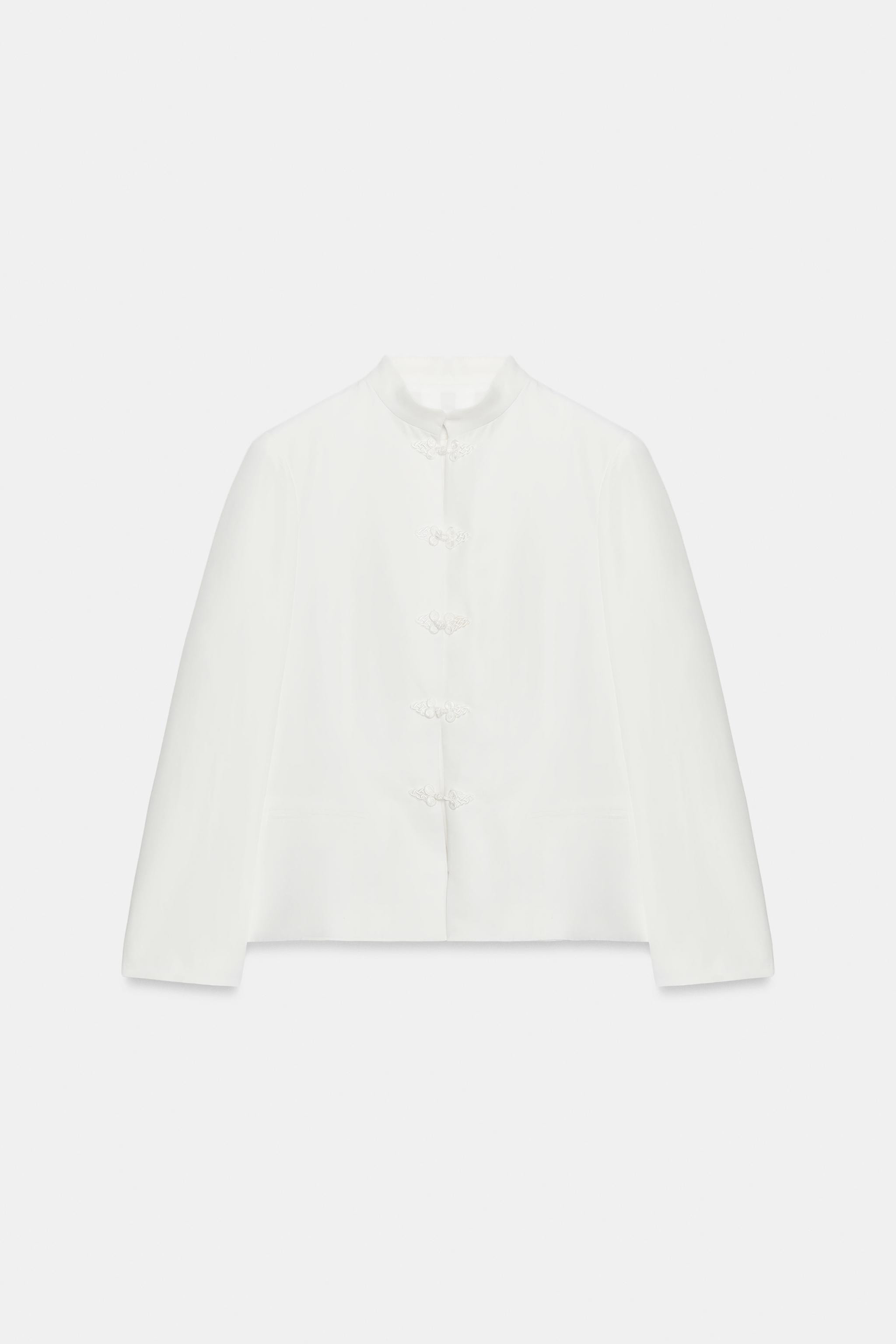 ZARA WOMAN COLLECTIONBlazer made from 21% linen yarn. High neck and long sleeves. Flared hem. Int... | Zara US