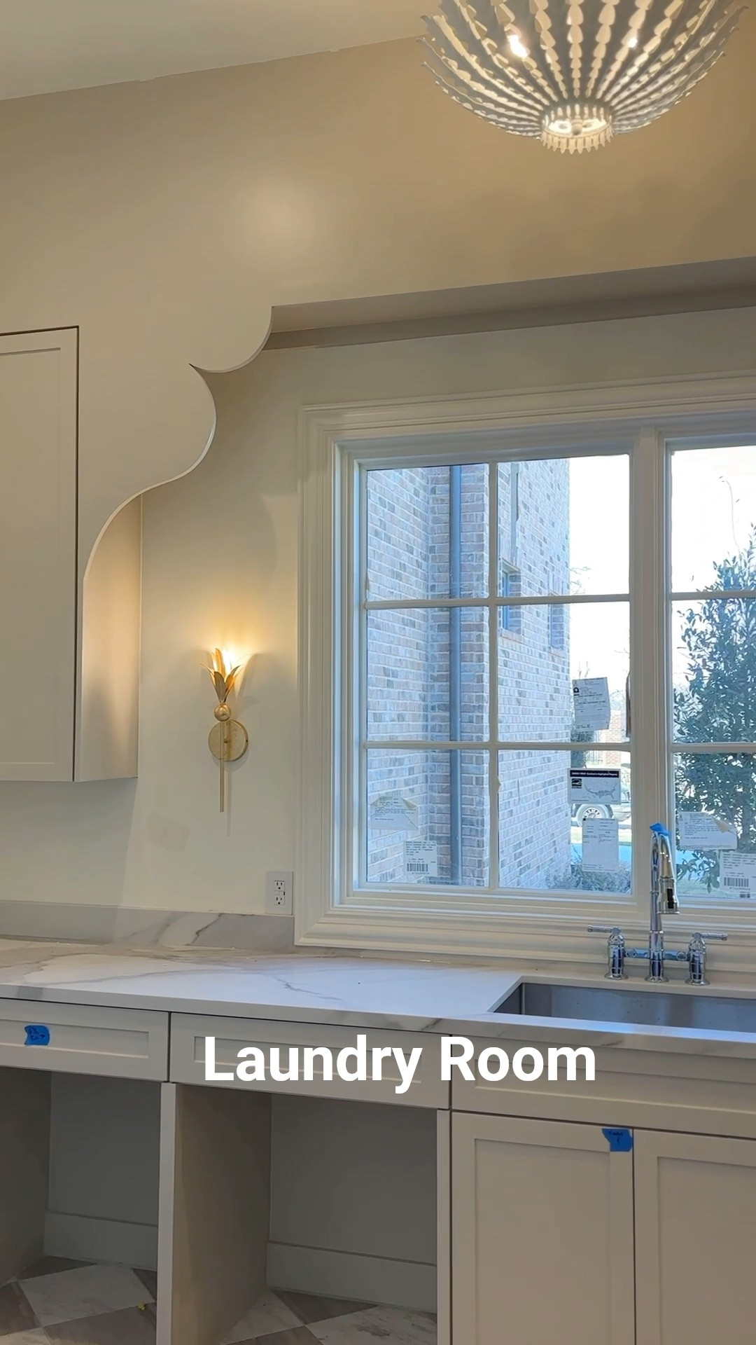 Laundry room details including sconces, pendant, laundry baskets / hampers and washer/dryer combo.

#LTKFamily #LTKHome