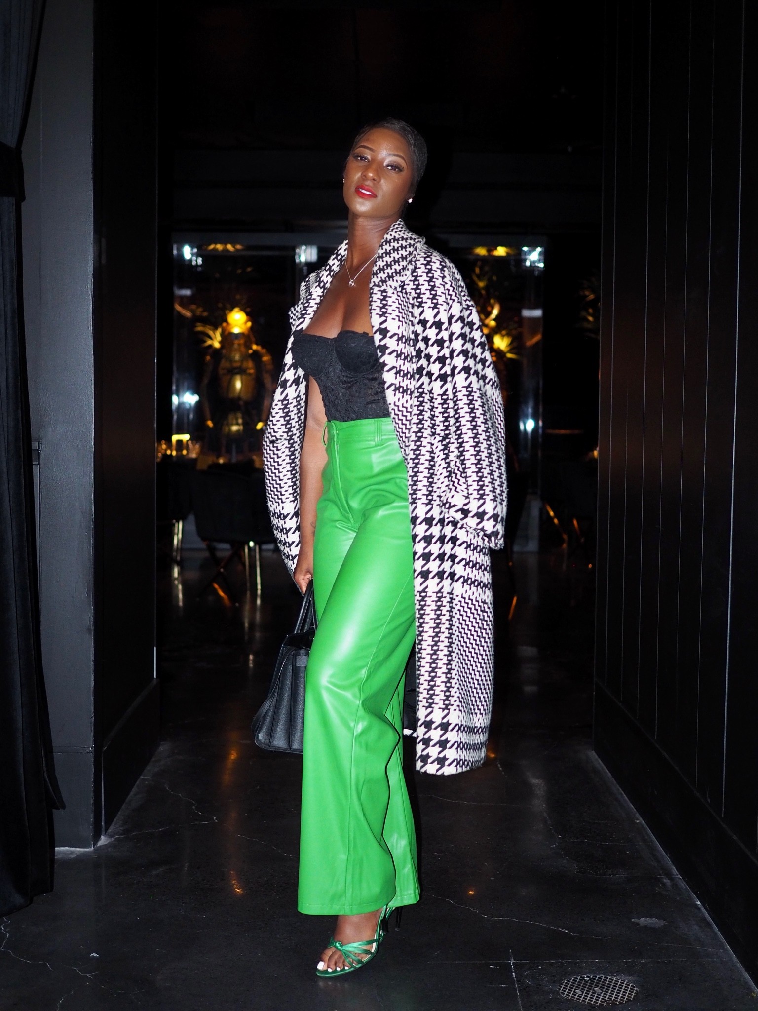 Green faux leather pants perfect for fall and such a great fit! I’m wearing US size 4. I paired it with a black corset top, green shoes, and coat. 

#LTKSeasonal #LTKunder100