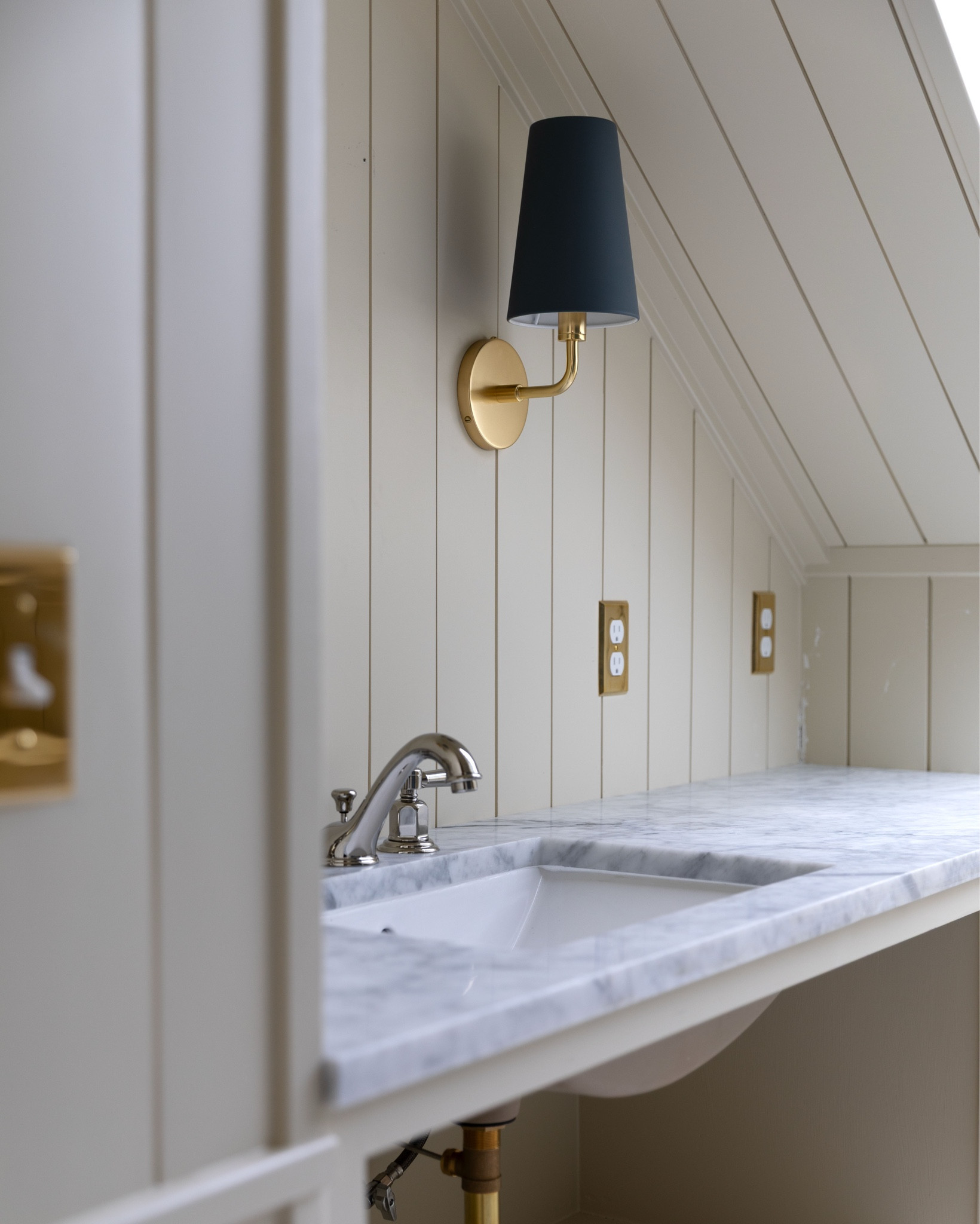 Hill House hall bath renovation progress! 

Color - F&B Off White (matched by Sherwin Williams)
Sconces - aged brass + matte dark slate shade
Plate covers - unlaquered brass  
Faucet - polished nickel 
Marble - vintage from Second Use  Seattle 

Next up…a cabinet skirt and drawer hardware! 

#LTKHome