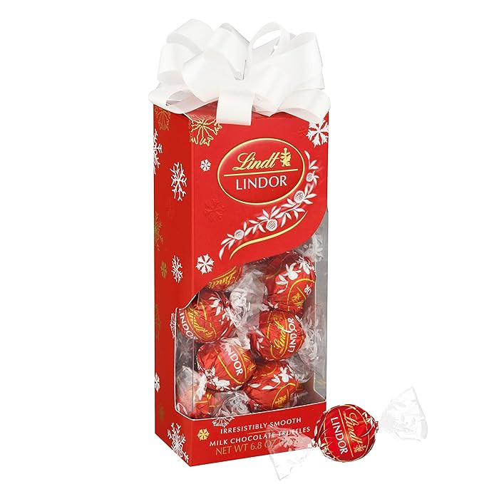 Lindt LINDOR Milk Chocolate Candy Truffles Traditions Gift Box, Milk Chocolate Candy with Smooth,... | Amazon (US)