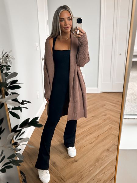 Amazon fall outfit idea, flare seamless jumpsuit fits TTS & is so comfortable, paired with this duster knit cardigan, size small. This would make a great travel outfit! This outfit is apart of the amazon prime big day deals event, if you’re a prime member you get access to the exclusive early holiday deals! #amazon @amazon #ad #founditonamazon #fallfashion 