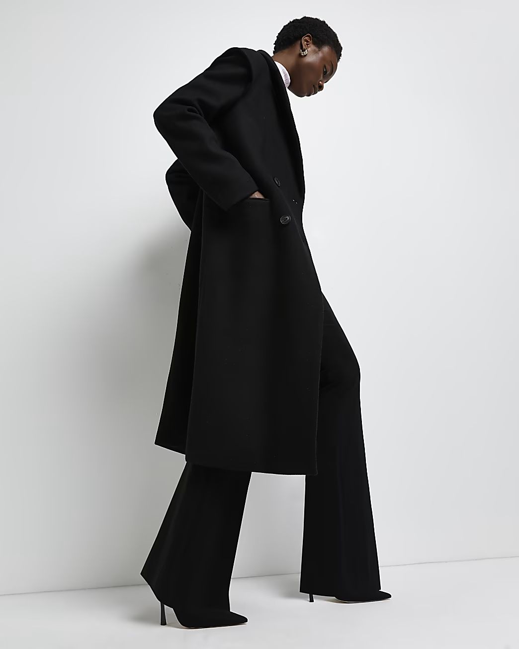 Black padded shoulder longline coat | River Island (UK & IE)