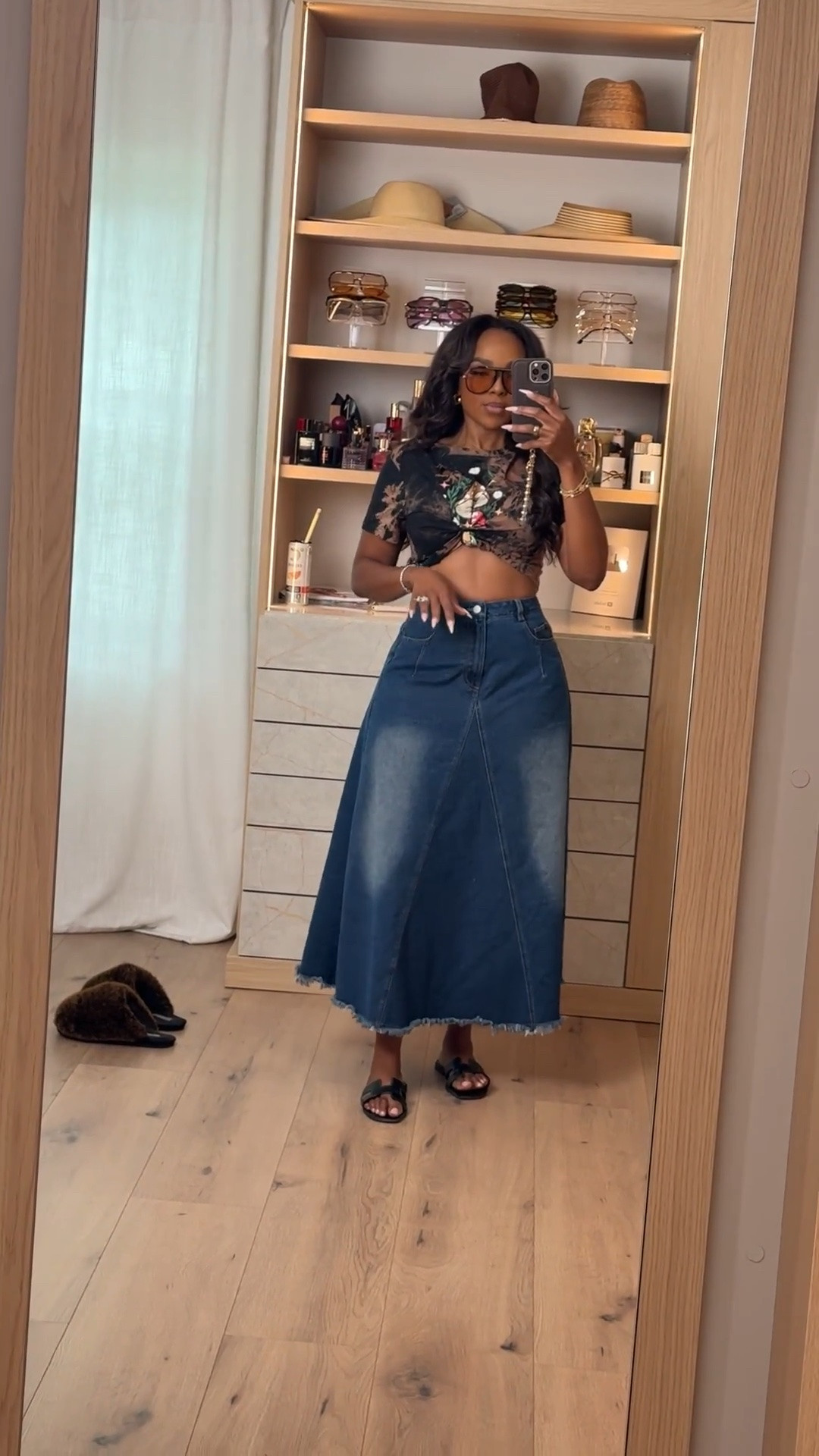 Hi Babes! 

Okay this denim midi skirt moment is SO good 🤎 The dark wash denim mixed with the vintage-inspired graphic tee gives that effortless cool-girl vibe while still looking put together. I love how easy this outfit feels but it still makes a statement, especially paired with oversized sunnies and simple sandals.

This is the kind of look you throw on when you want to feel cute without overthinking it. Casual, flattering, and perfect for everyday summer styling ✨

Perfect for:
• Weekend errands  
• Casual brunch dates  
• Farmers markets  
• Coffee runs  
• Summer travel days  
• Everyday elevated casual looks  

Everything is linked below 🤍

xx Kira | IG: KirasFashionFinds

34D - 27 - 40 • Size Small or 4

#LTKgrwm #LTKootd #LTKvlog