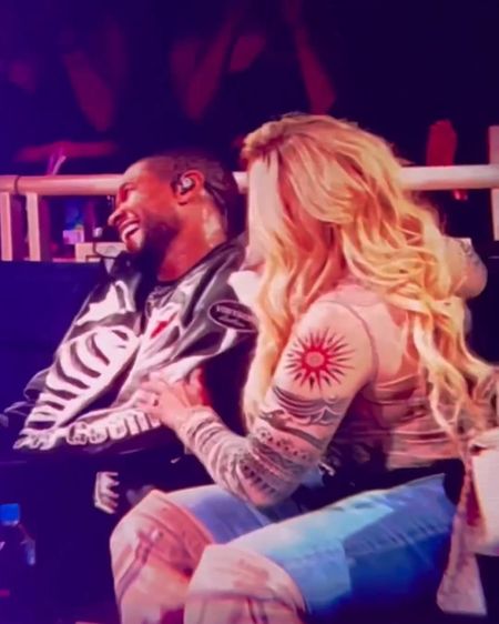 Mary J. Blige Joked around with Usher at his concert wearing Jean Paul Gaultier. Cute!