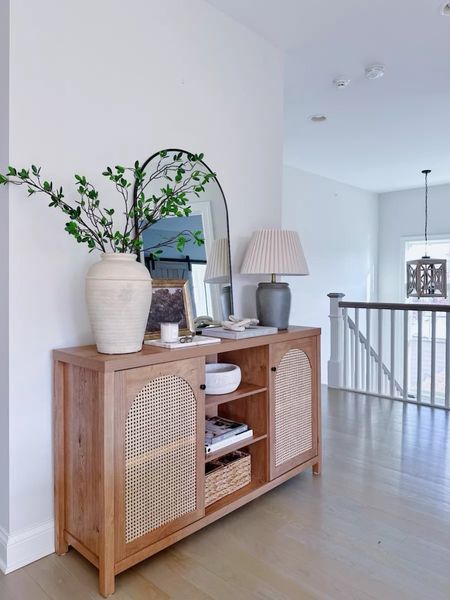 Love my pretty new sideboard console table, and you will NOT believe the price! Pretty to style but also so much storage!! Love this arched mirror too!

(4/16)

#LTKhome #LTKstyletip