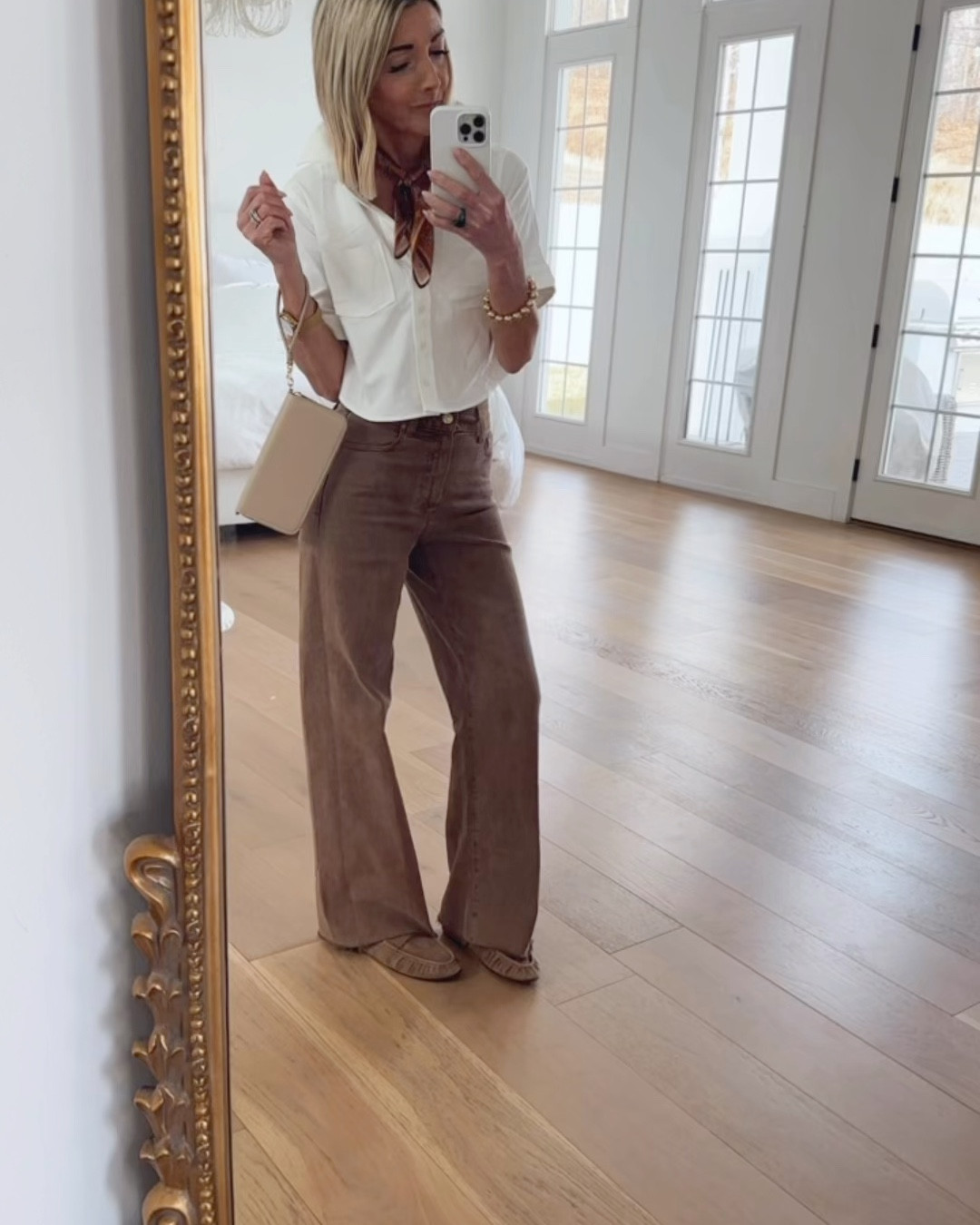 OOTD that you will want to bookmark & add to your spring /summer wardrobe! These jeans went viral for a reason , the Brown color , raw hem , perfect fit . Wearing my normal 25 .. I paired them with this cropped white button down , I’m 5’5 & it’s hits right at the top of my jeans … wearing XXS , These mules are back In Stock & go with everything !!! TTS … add a silky scarf & wristlet , your welcome ☺️

#LTKootd #LTKBeauty #LTKOver40