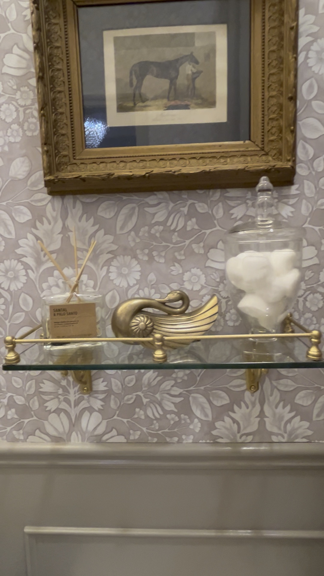 This little glass shelf with the faux brass rail is so easy to put together! I’ll link everything you need!

#LTKHome #LTKWatchNow