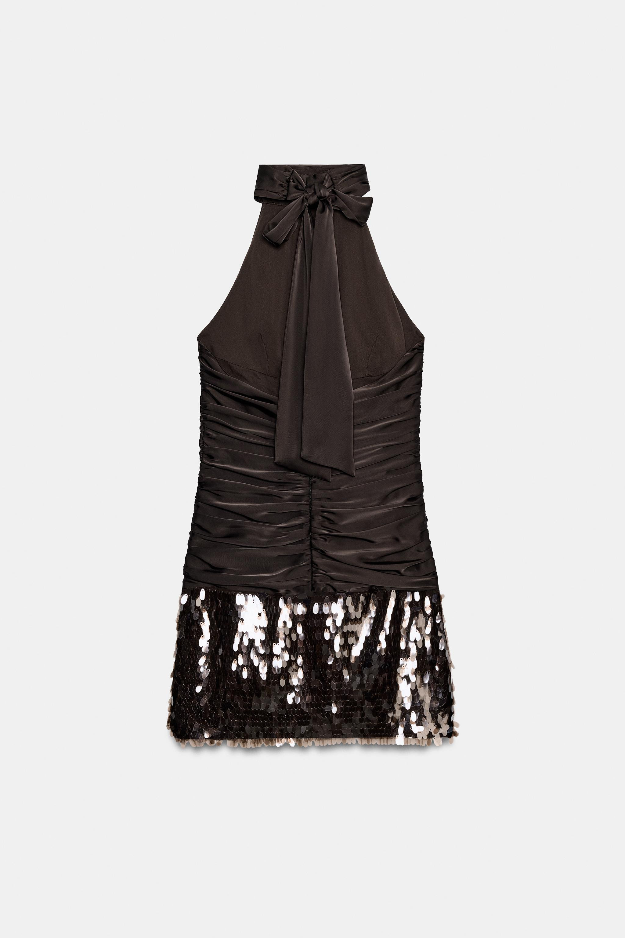 Halter neck dress with tie closure and open back. Featuring ruched detail and sequined hem. Inter... | Zara US