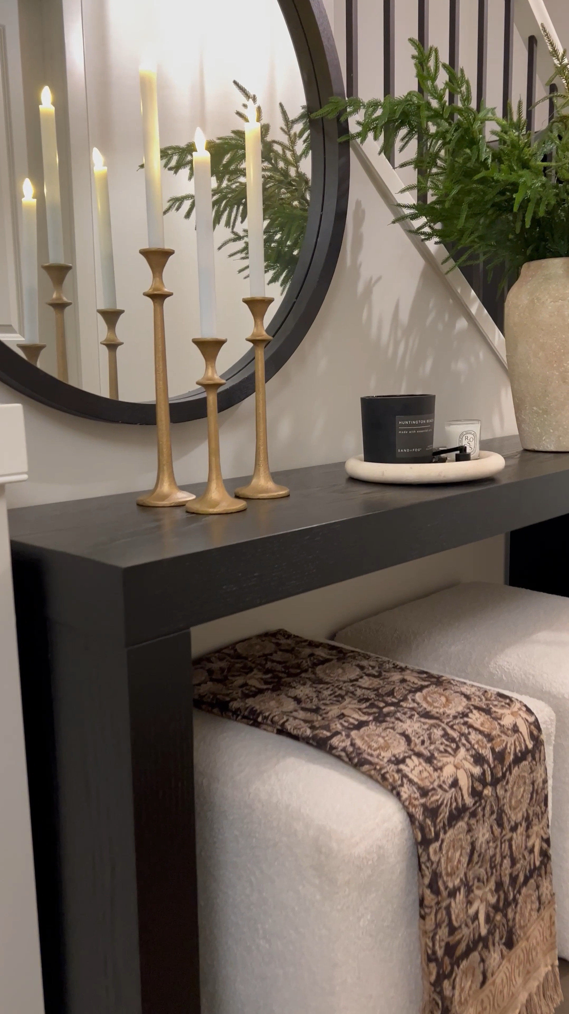 Christmas is just around the corner can you believe?! 😆 I styled this cream ceramic vase with Norfolk pine stems. These sell out fast so hurry and grab yours! 😜 …

Black console table
Round black mirror
Set of 3 candle holders 

#LTKVideo #LTKHoliday #LTKHome