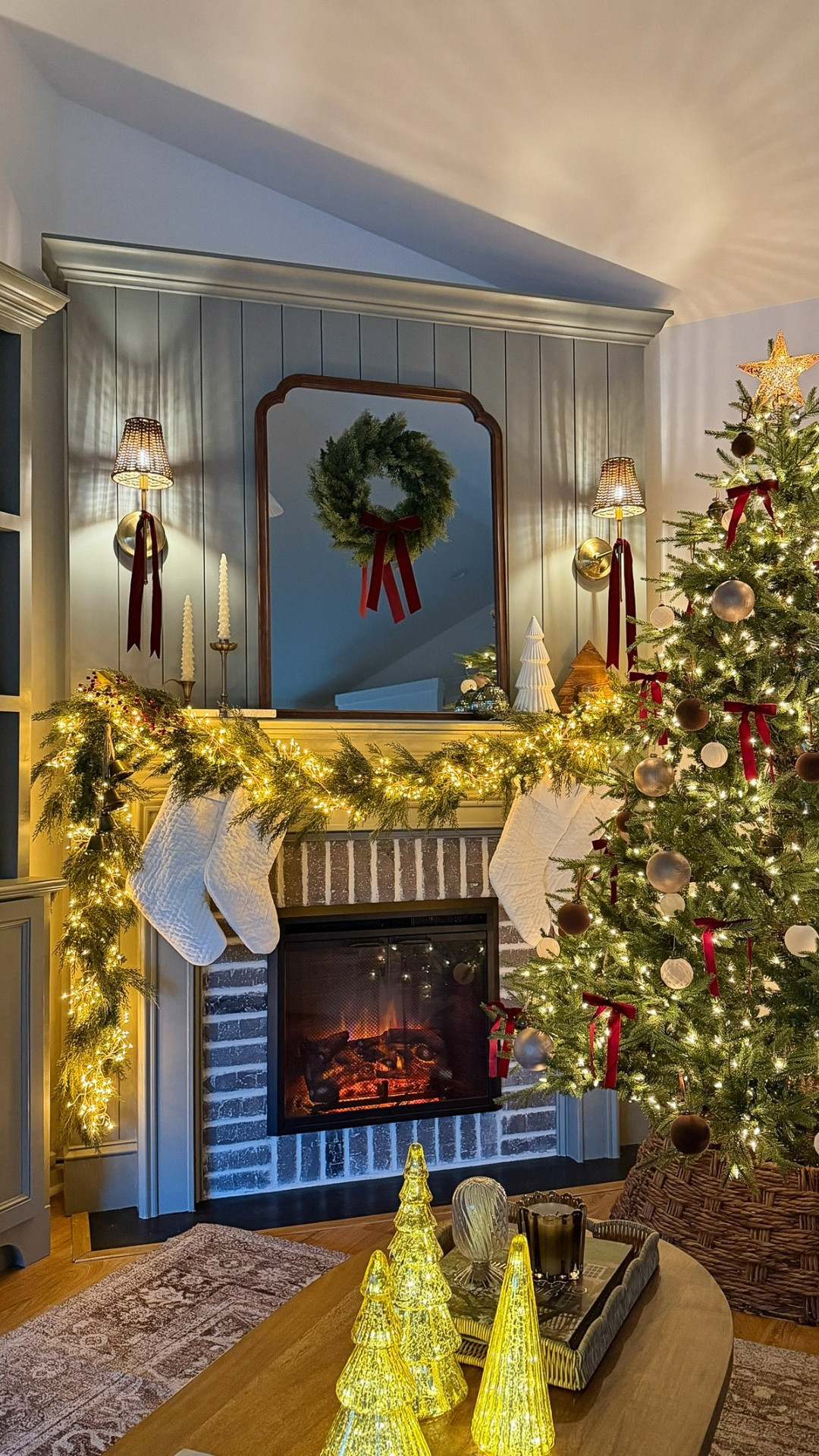 Our mantel decorated with Christmas! 

Fairy twinkle lights, Christmas mantel decor, garland, velvet stockings, light up trees, faux Christmas tree, faux wreath, Christmas ornaments, velvet ribbon

#LTKHome #LTKSeasonal #LTKHoliday