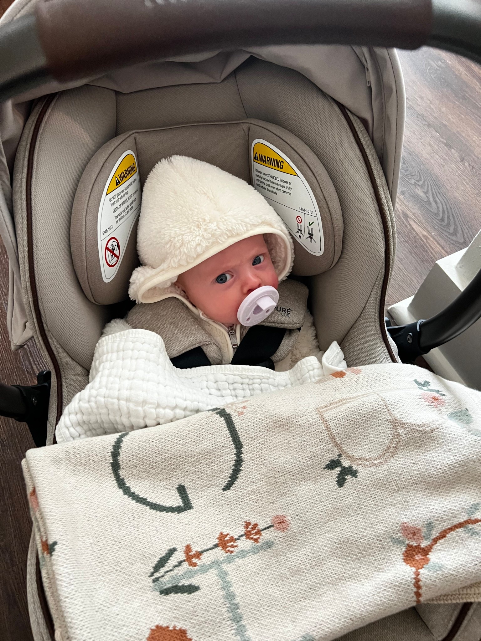 Can’t find the exact snowsuit or blanket but linked similar!