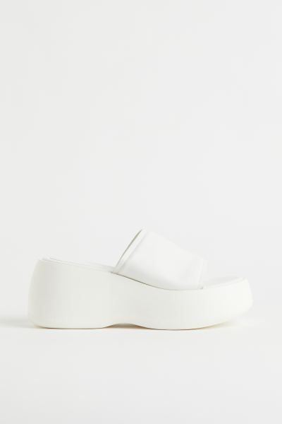 Platform sandals in faux leather with round, open toes and a wide foot strap. Jersey lining, faux... | H&M (US + CA)