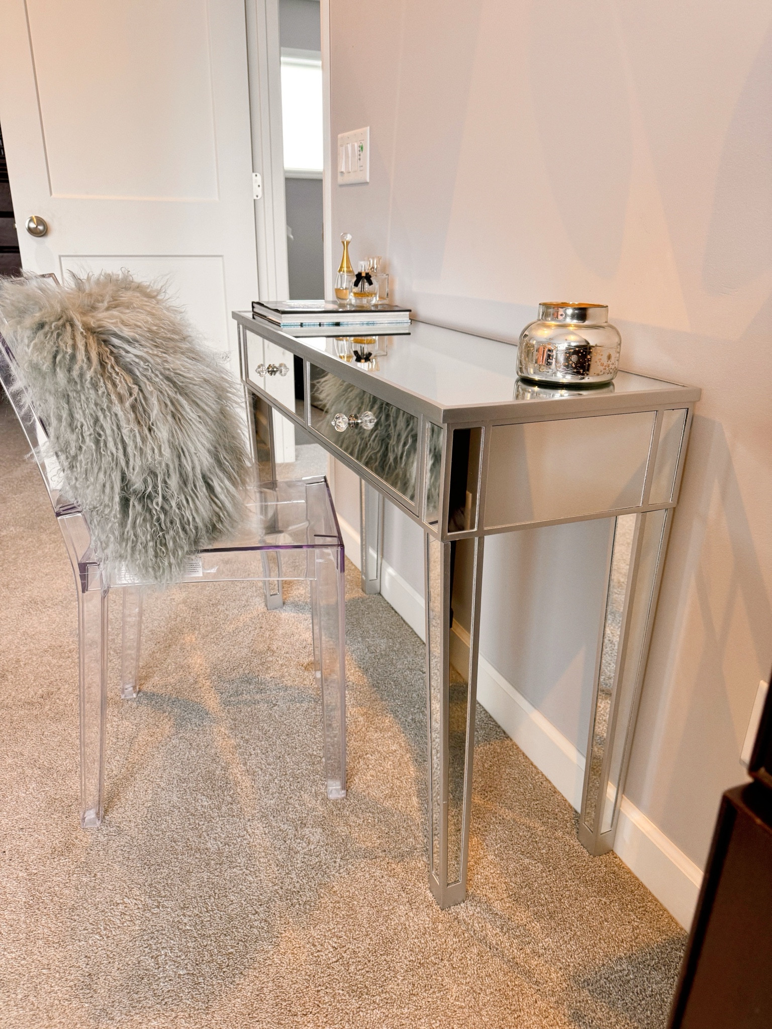 Vanity table 
Ghost chair 
Vanity 
Makeup station 