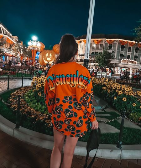 Halloween Time at the Disneyland parks calls for oversized spirit jerseys! You can only get this Disneyland one at the park but I linked Disney jerseys that are available to the public. Mine is in a medium, paired with cut off shorts, Fanny pack and crocs! #DisneyOutfit #DisneyParkOutfit #HalloweenOutfit #DisneyOOTD 

#LTKHalloween #LTKSeasonal #LTKHoliday