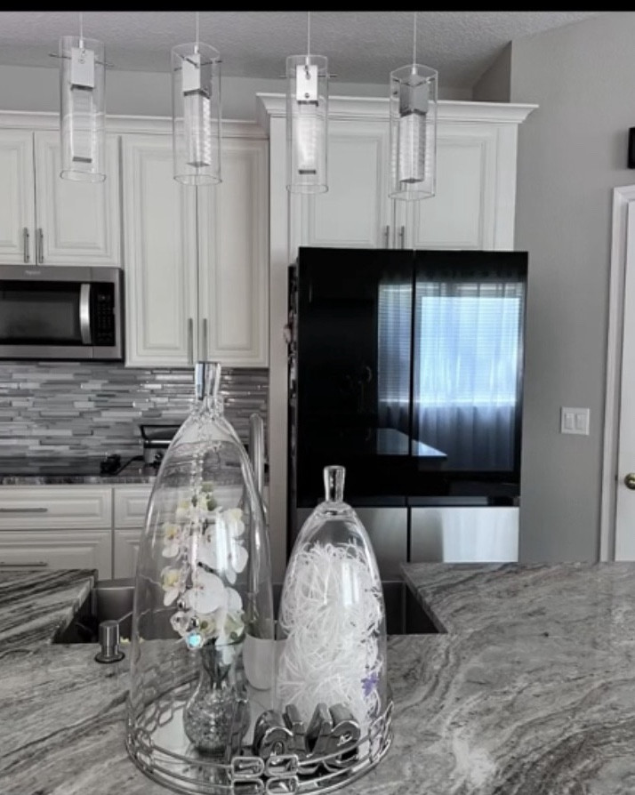 **✨ Kitchen Decor Inspiration ✨**  

Your kitchen is the heart of your home, so why not make it as stylish as it is functional? 🏡💖 Sleek modern finishes, here are some of my favorite kitchen decor finds to refresh your space!  
To upgrade my cylinder canisters I glue crystal knobs to make it more stylish.
**🛒 Shop My Kitchen Picks below**  
Swipe up on my LTK shop for all the links! 🛍️ Which look is your favorite? Let me know in the comments! 👇💬  

#KitchenDecor #HomeInspo #StylishSpaces #KitchenGoals

#LTKHome #LTKU #LTKHome