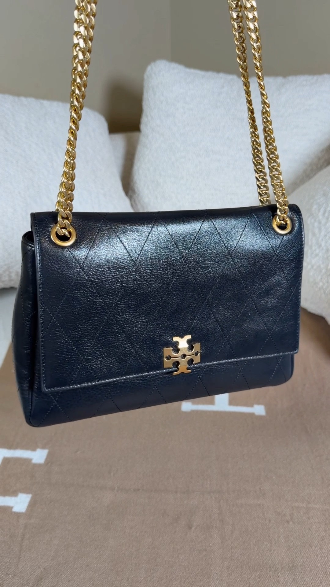 Why is this Tory Burch bag not sold out like the Charlie drawstring bag?! It’s so much nicer 😍

I just got my very first Tory Burch bag and I love her! When I was looking into getting my coach Chelsea, the Tory Burch Charlie was compared to it a lot with some people even claiming that it’s even nicer. I had to see for myself and I tried to find the  vital large Charlie bag to compare to my Chelsea 36 or the vital Charlie drawstring bag in black but of course they are sold out everywhere. I saw this one on the top shelf and finally mustered up enough courage to ask someone if I could see it (I hate asking people to get stuff off the top shelf for me) 😭 but they were so nice! As soon as I tried on this regular sized quilted black Charlie with chain straps I loved her way more than the large! 

She is the perfect size and the chain makes her look so much more elevated. The chain straps also have leather on the shoulder part so it is still comfortable.

Why is this Tory Burch Charlie not viral?! I think it’s the best one 😍

#toryburch #toryburchbag #coachbqg #coachbags