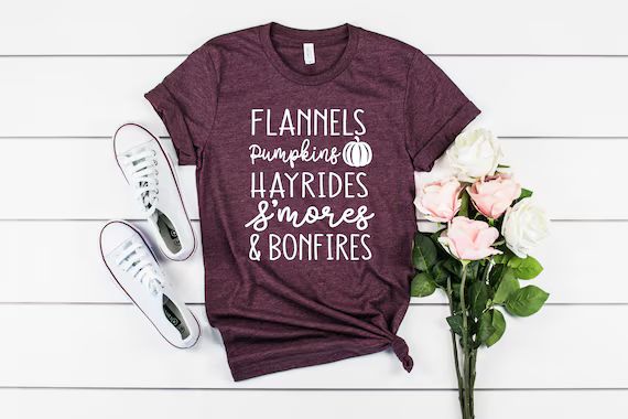 Read the full title
    Flannels Pumpkins Hayrides Smores Bonfires Shirt, Thanksgiving Shirt, Tha... | Etsy (US)