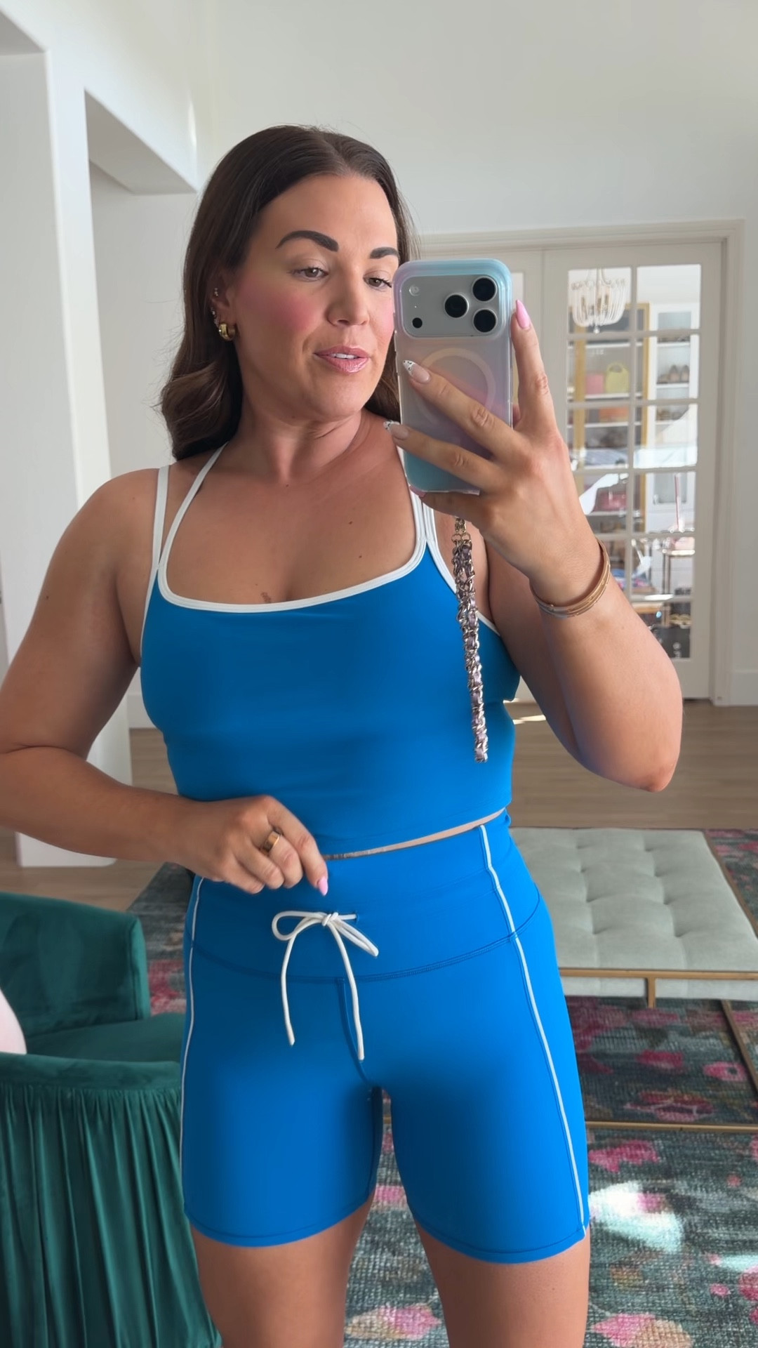 curvy midsize blue fitness set look! wearing size large in tank and size large in 5” shorts. love the white piping! 💙 @Vuori US 

#LTKfitnessgoals #LTKActive #LTKMidsize