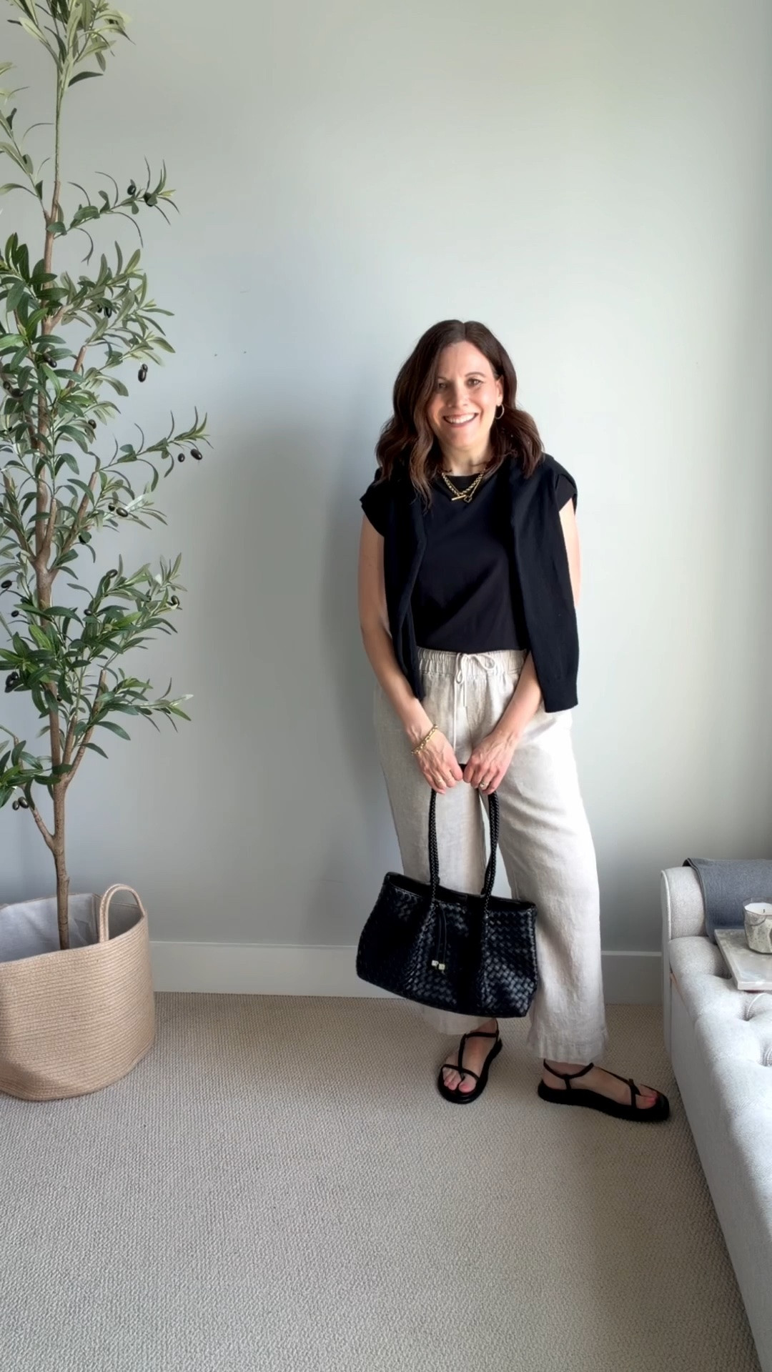 I love this outfit because it’s so simple but still feels finished. I’m wearing a black cap-sleeve tee (the LOFT Modern Wedge tee, which I own in multiple colors). It runs big, so I size down. These Quince wide leg linen pants fit TTS. I’m in the 28” inseam and a size medium.

#LTKSaleAlert #LTKOver40 #LTKMidsize