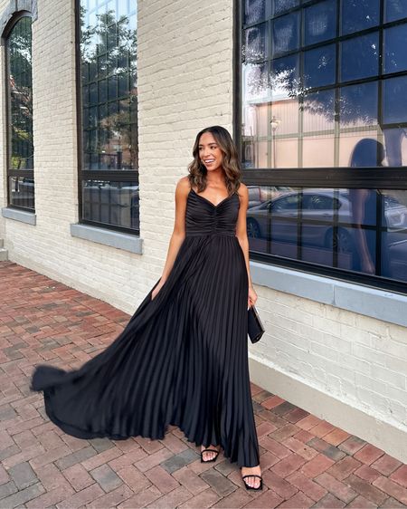 Size 2 in black pleated maxi dress! Fits TTS and is the most comfortable and stunning wedding guest dress or formal event dress! 

#LTKunder100 #LTKwedding #LTKstyletip