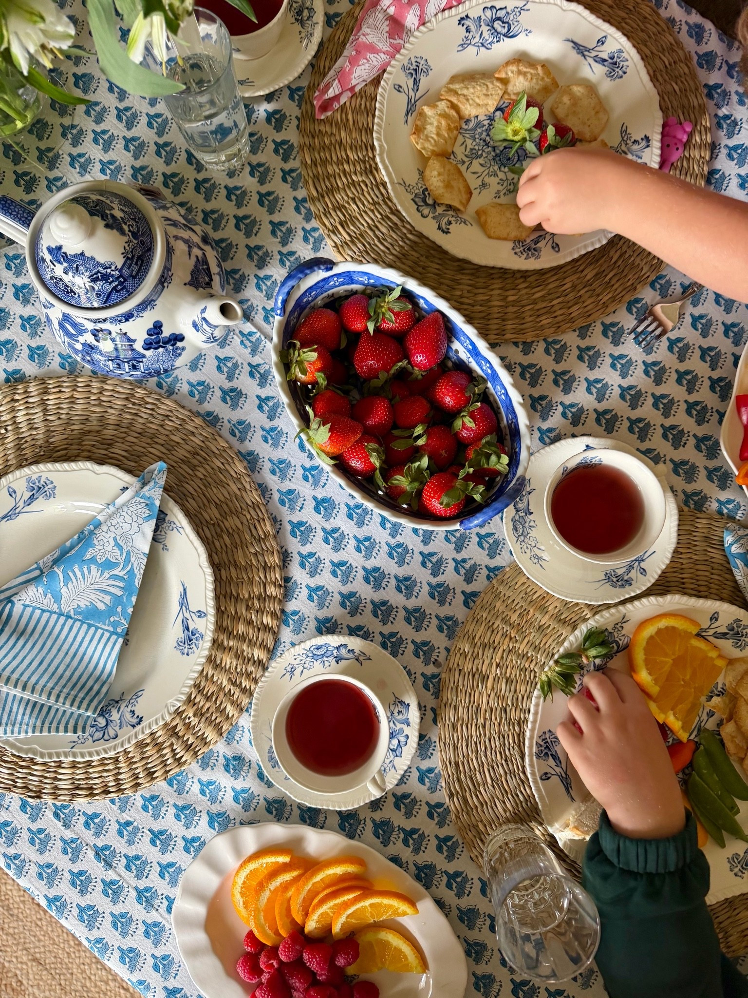 Set up a tea party for snack time today. Featuring this beautiful 100% cotton block print tablecloth from a small business that makes them in just about any size you want and so many colors! Also using their beautiful patterned napkins that are in a super soft cotton. Also got these new seagrass chargers that are so affordable but so classy and go with everything!

#LTKSeasonal #LTKfoodie #LTKmomlife