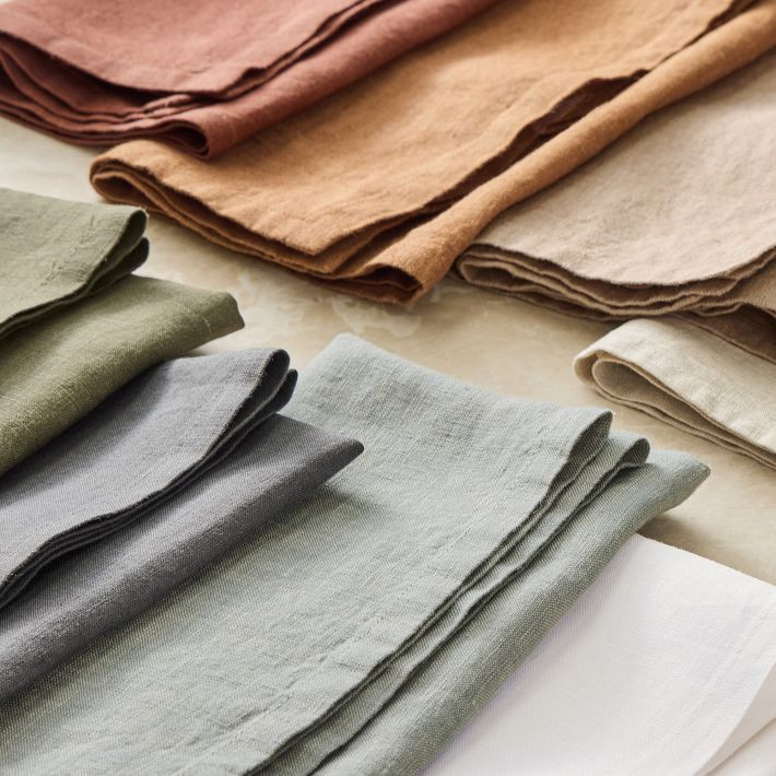 Linen napkins fanned out in a range of colors